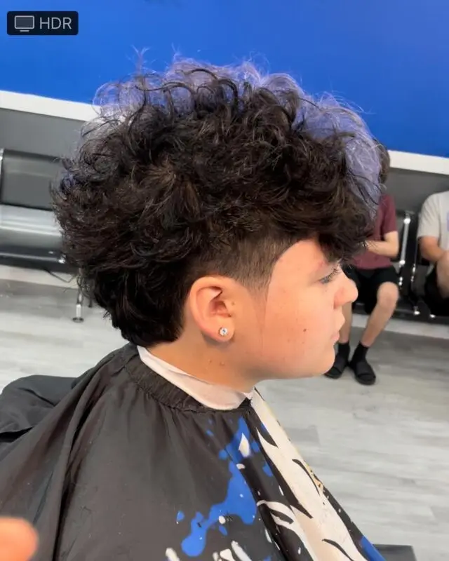 Curly top with a low taper on a kid
