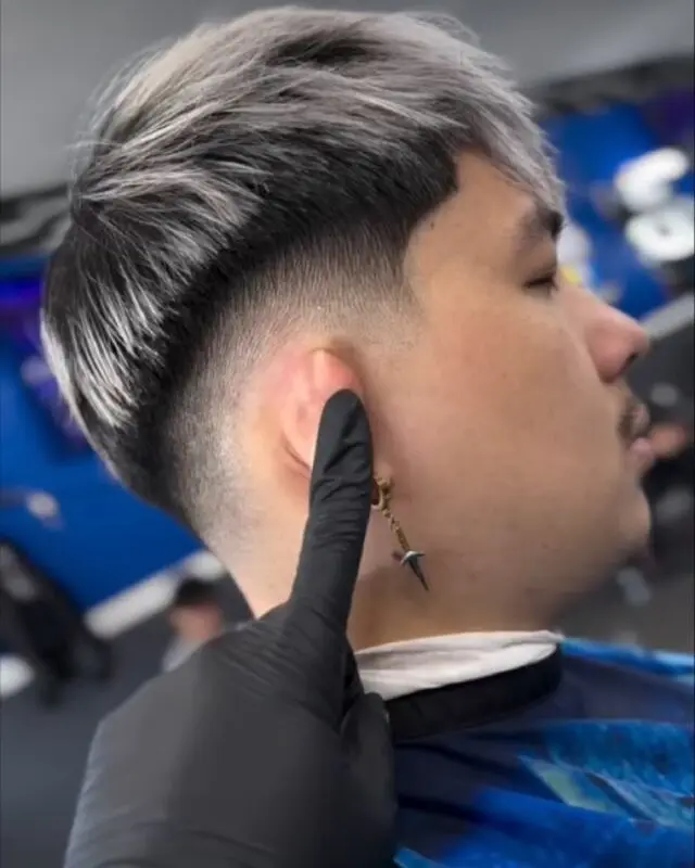 Two-tone silver top with a drop fade