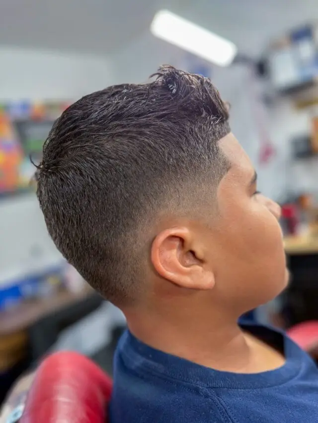 Textured top with a taper on a young boy