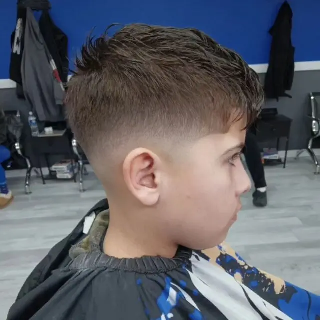 Classic short cut with a skin fade on a kid
