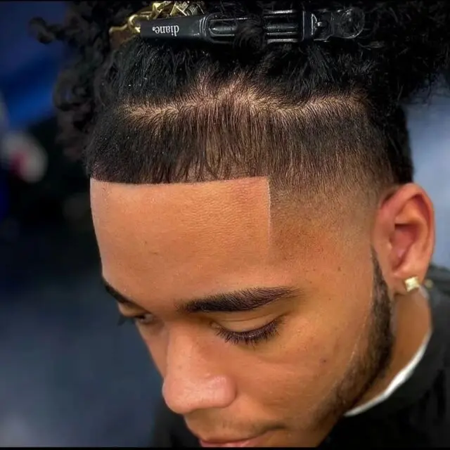 Sharp hairline line-up on a waved cut